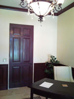 Office Door Woodgrained to match paneling.