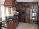 Dark oak kitchen cabinets